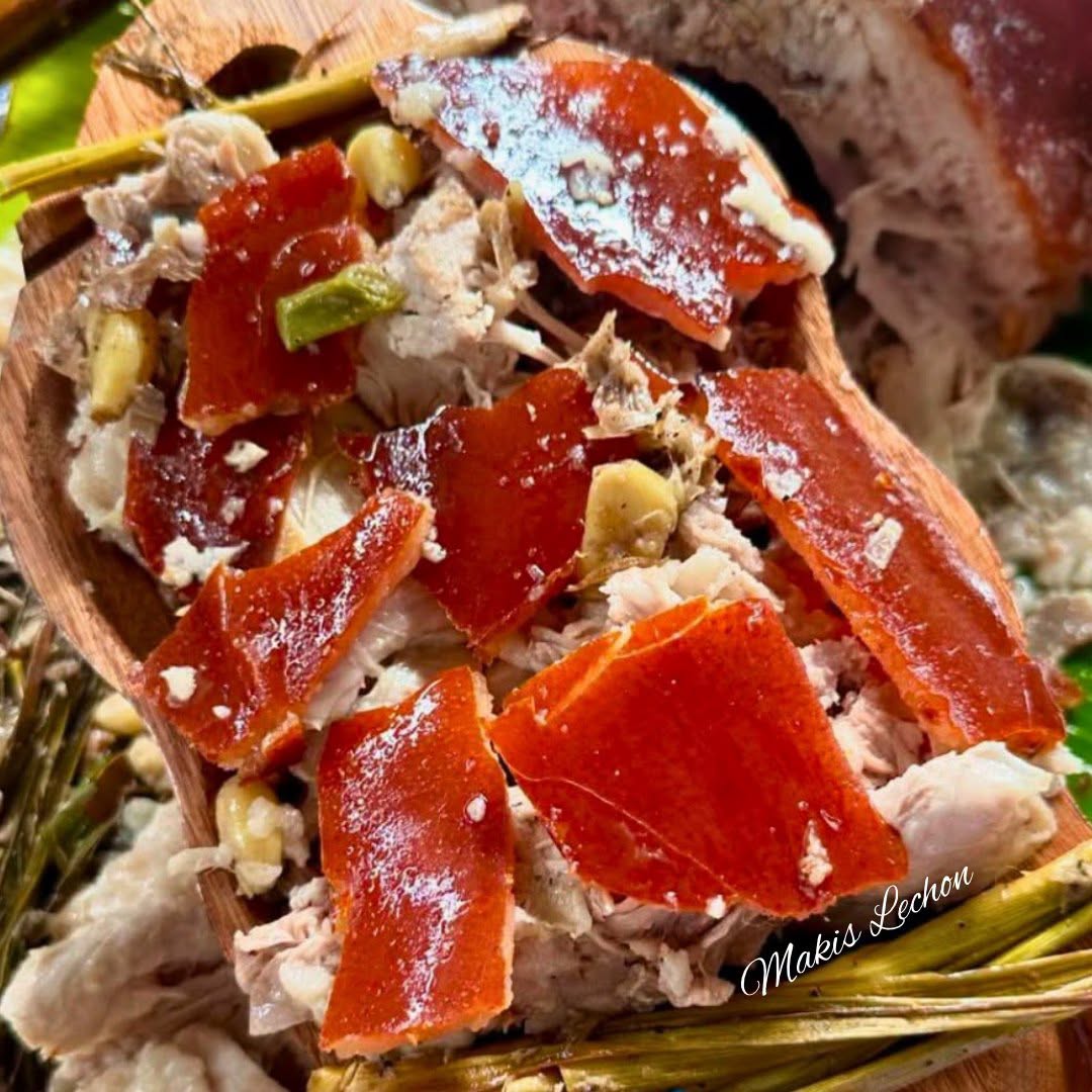 Close-up of freshly chopped crispy lechon skin and juicy meat