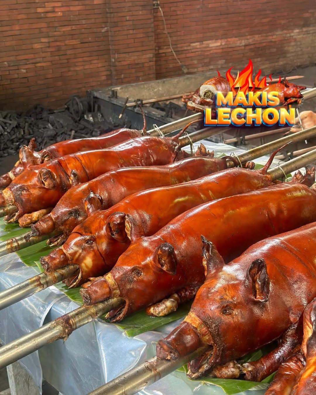 Lechon roasting over charcoal